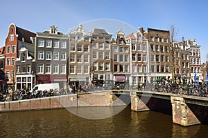 View of Leliegracht bridge spanning Prinsengracht canal in Amsterdam.